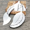 Kreatives Klappmesser aus Edelstahl in Blattform Kreatives Klappmesser aus Edelstahl in Blattform