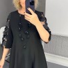 Ausgestelltes Kleid in bergre mit Punktedekor Ausgestelltes Kleid in bergre mit Punktedekor