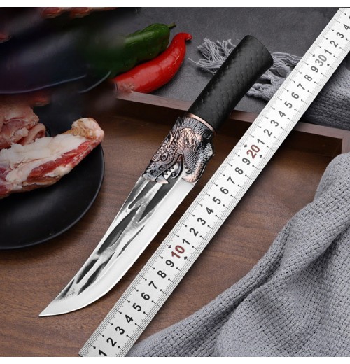 Knochenschneidemesser mit Drachenverzierung und Scheide. Knochenschneidemesser mit Drachenverzierung und Scheide.
