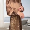 Zweiteiliges Set aus langrmeligem Top und Pailletten-Maxirock für Damen Zweiteiliges Set aus langrmeligem Top und Pailletten-Maxirock für Damen